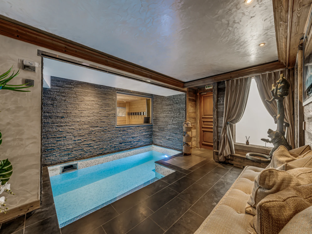 Private swimming pool at Chalet St Christophe, a luxury chalet in Courchevel
